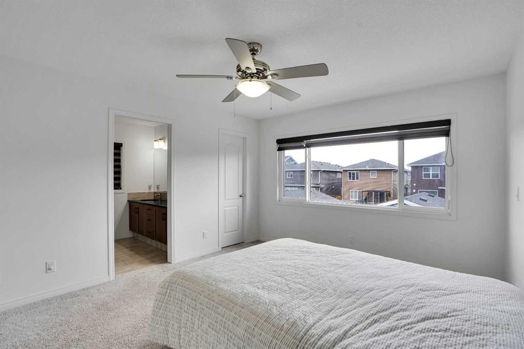 726 Redstone Drive Ne, Calgary, AB - Indoor Photo Showing Bedroom