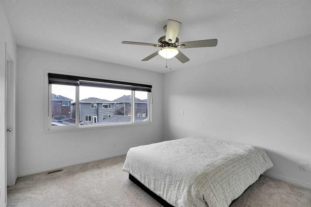 726 Redstone Drive Ne, Calgary, AB - Indoor Photo Showing Bedroom