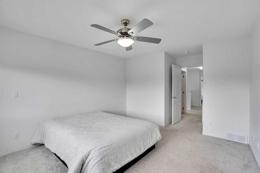 726 Redstone Drive Ne, Calgary, AB - Indoor Photo Showing Bedroom
