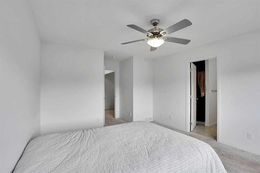 726 Redstone Drive Ne, Calgary, AB - Indoor Photo Showing Bedroom