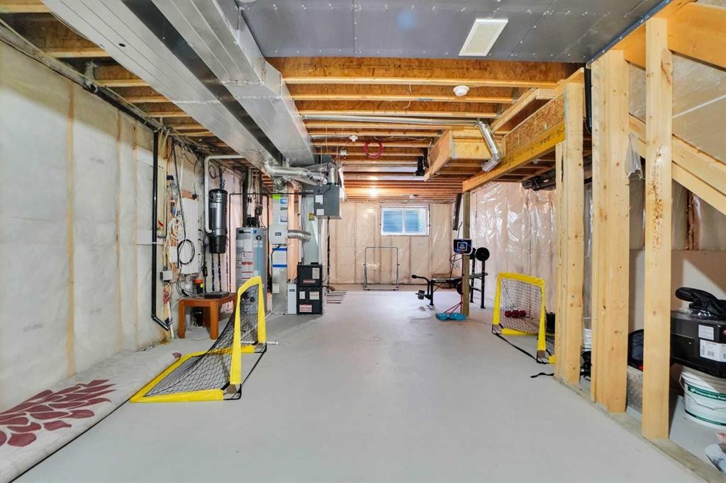 726 Redstone Drive Ne, Calgary, AB - Indoor Photo Showing Basement