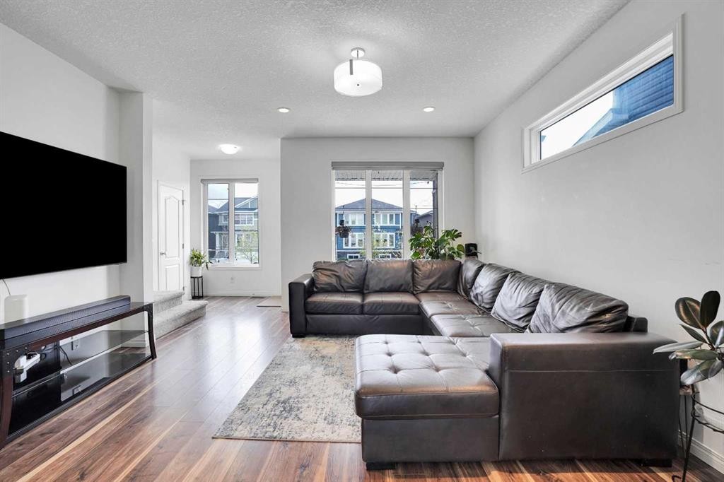 726 Redstone Drive Ne, Calgary, AB - Indoor Photo Showing Living Room