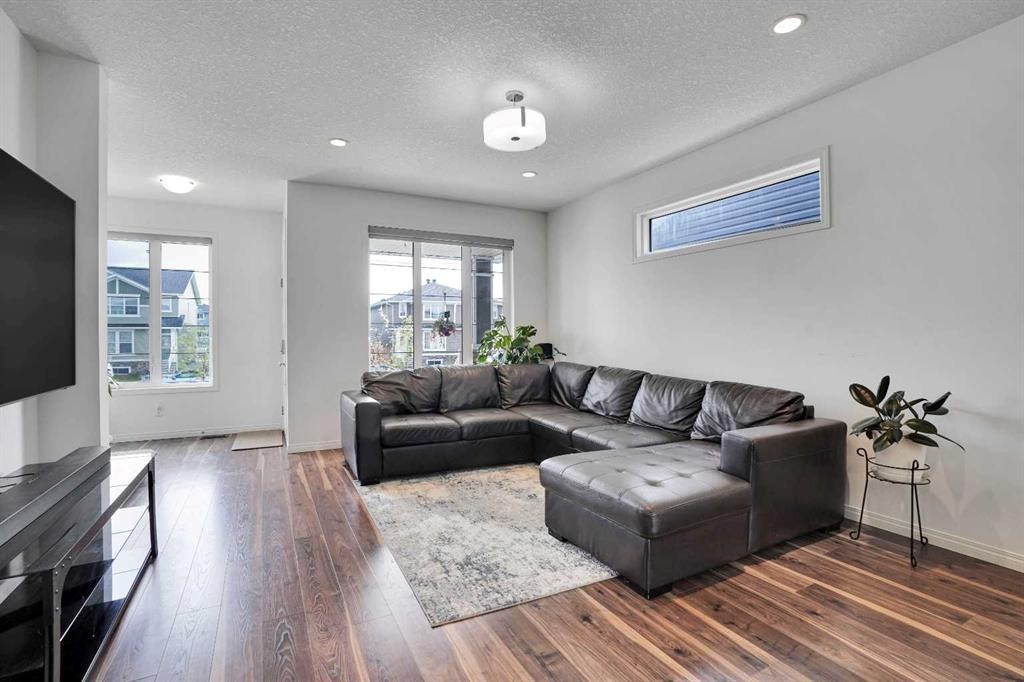 726 Redstone Drive Ne, Calgary, AB - Indoor Photo Showing Living Room