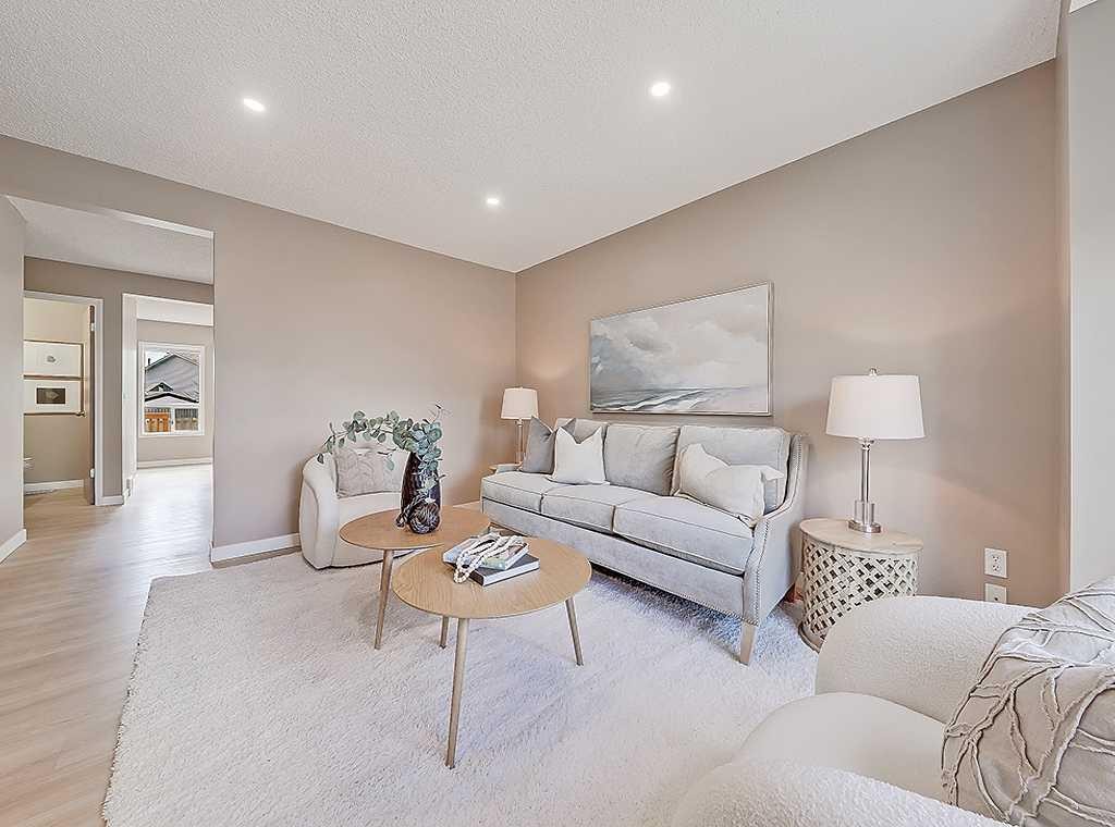 292 Coventry Close Ne, Calgary, AB - Indoor Photo Showing Living Room