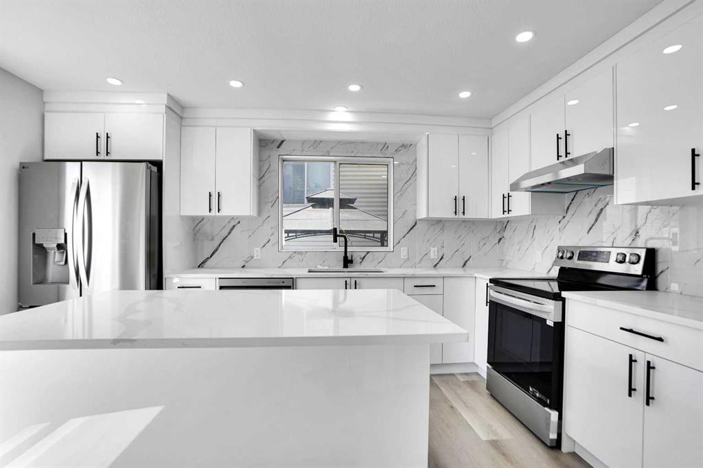 51 Martinridge Grove Ne, Calgary, AB - Indoor Photo Showing Kitchen With Stainless Steel Kitchen With Upgraded Kitchen