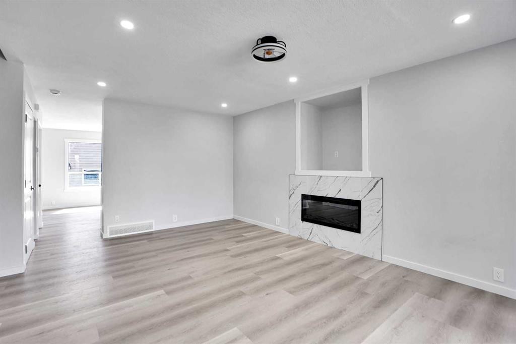 51 Martinridge Grove Ne, Calgary, AB - Indoor With Fireplace