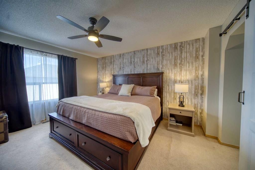 228 Oakmere Place, Chestermere, AB - Indoor Photo Showing Bedroom