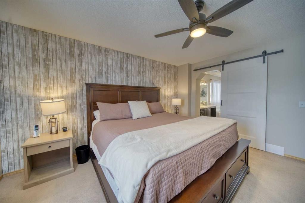 228 Oakmere Place, Chestermere, AB - Indoor Photo Showing Bedroom