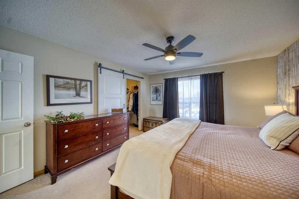 228 Oakmere Place, Chestermere, AB - Indoor Photo Showing Bedroom