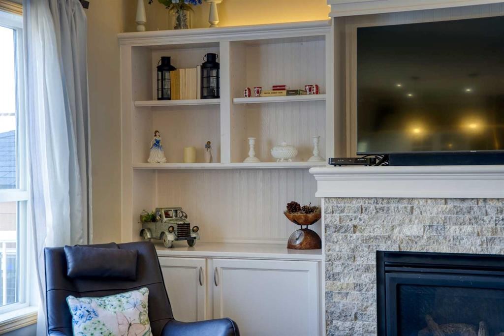 228 Oakmere Place, Chestermere, AB - Indoor With Fireplace