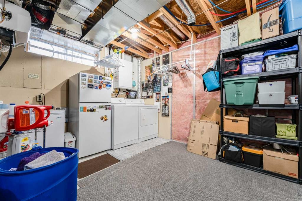 198 Somerside Park Sw, Calgary, AB - Indoor Photo Showing Laundry Room