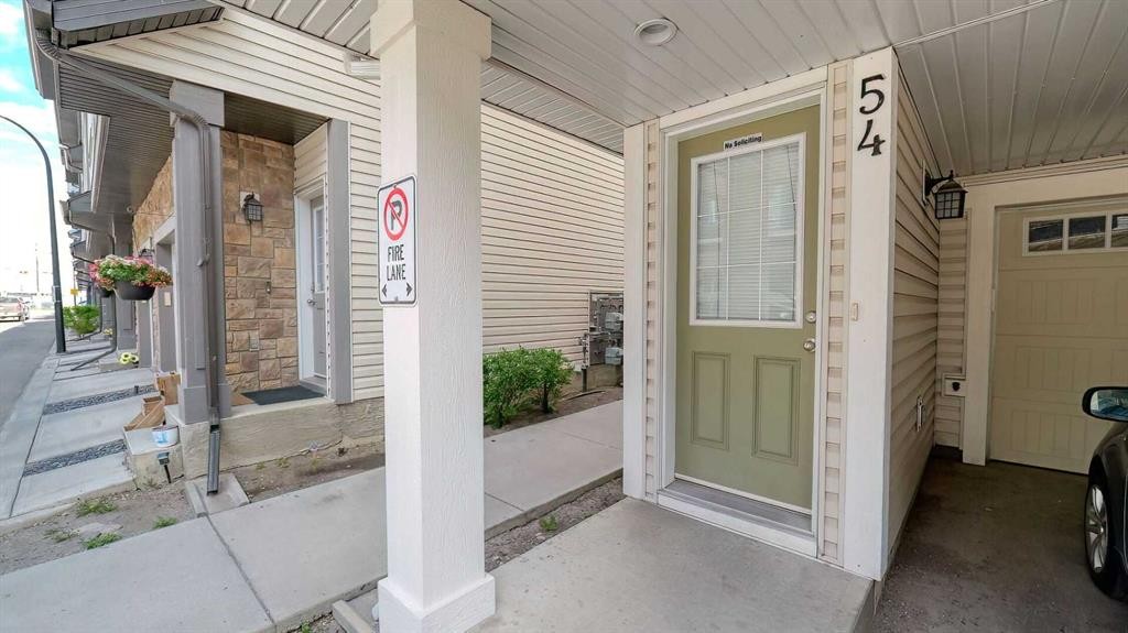 54 New Brighton Point Se, Calgary, AB - Outdoor With Balcony With Exterior