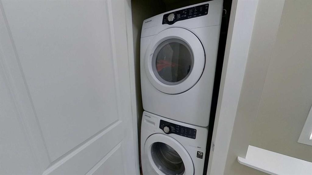54 New Brighton Point Se, Calgary, AB - Indoor Photo Showing Laundry Room