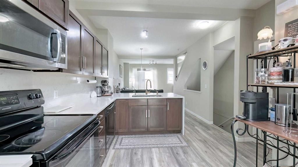 54 New Brighton Point Se, Calgary, AB - Indoor Photo Showing Kitchen