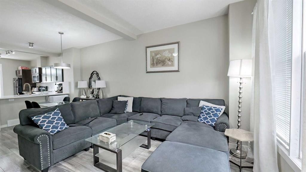 54 New Brighton Point Se, Calgary, AB - Indoor Photo Showing Living Room