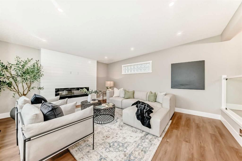 275 Silverview Way Nw, Calgary, AB - Indoor Photo Showing Living Room With Fireplace