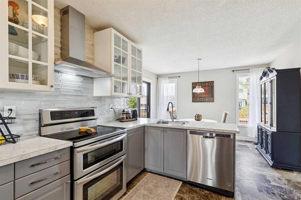 56 Riverbrook Road Se, Calgary, AB - Indoor Photo Showing Kitchen With Stainless Steel Kitchen With Upgraded Kitchen