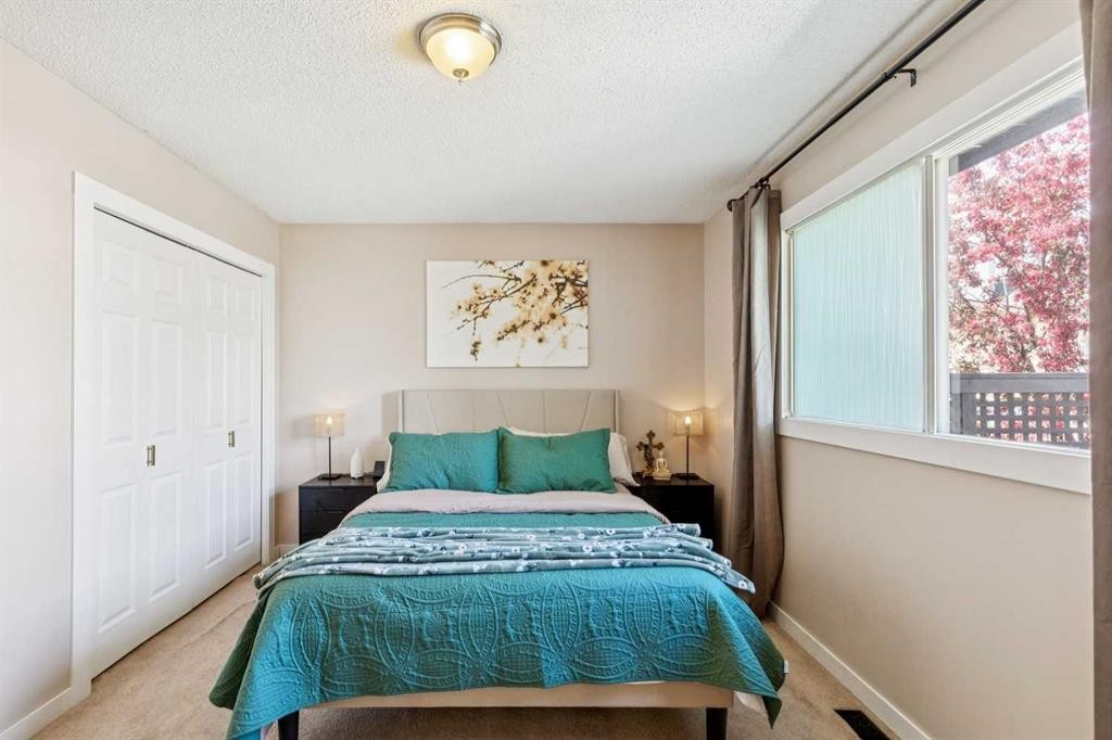 56 Riverbrook Road Se, Calgary, AB - Indoor Photo Showing Bedroom