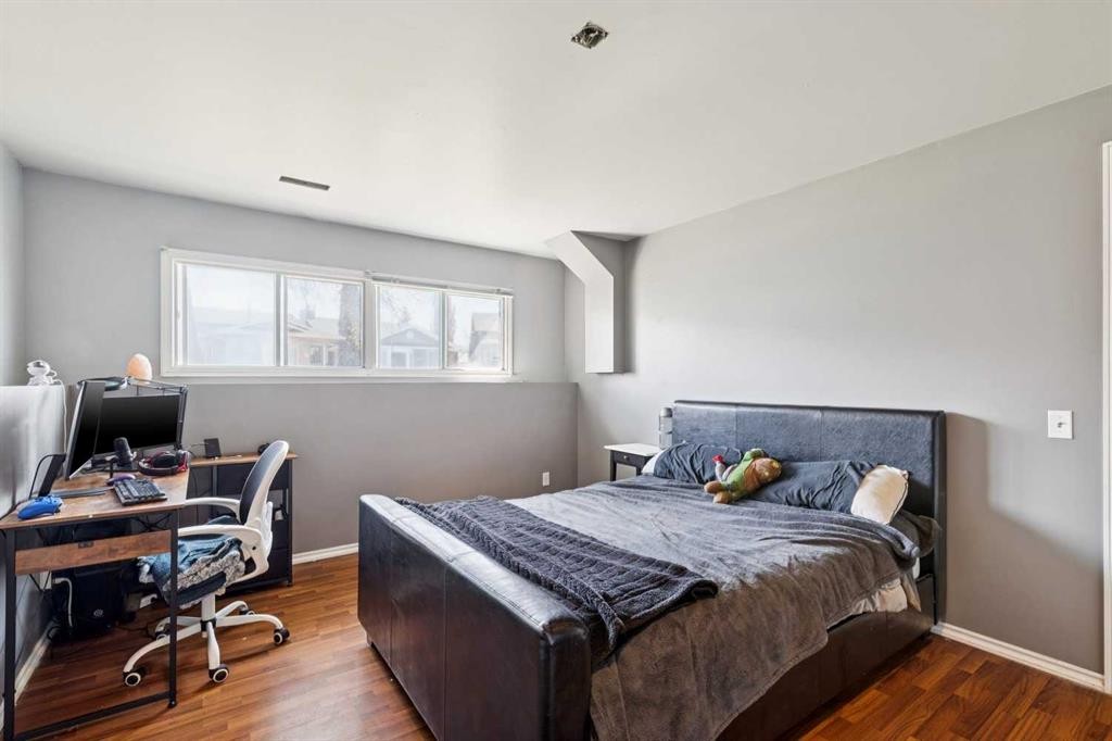 56 Riverbrook Road Se, Calgary, AB - Indoor Photo Showing Bedroom