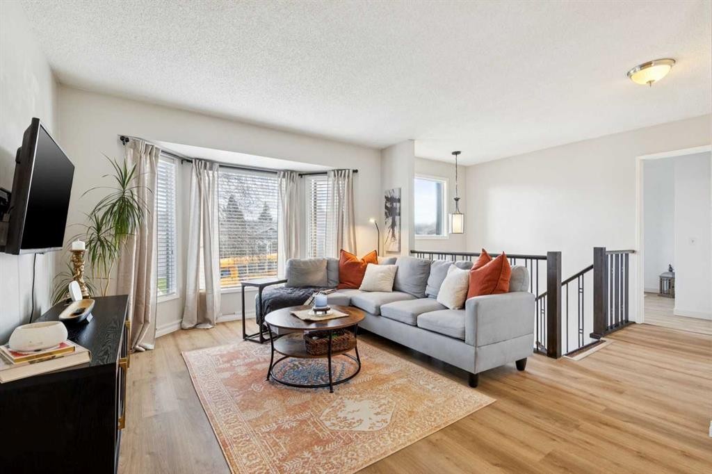 56 Riverbrook Road Se, Calgary, AB - Indoor Photo Showing Living Room