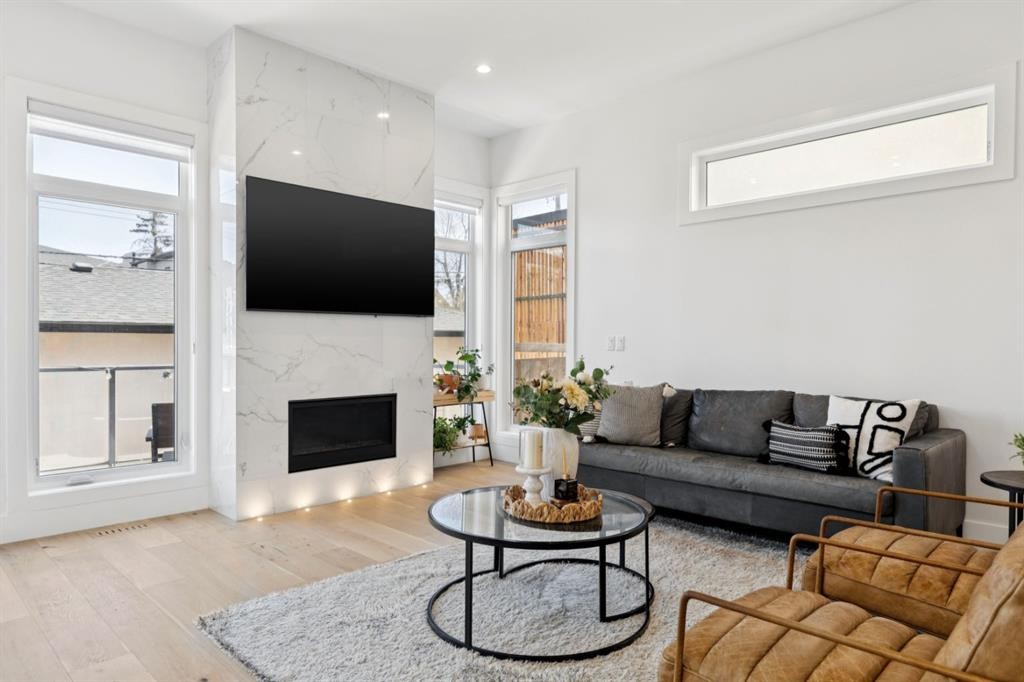 1424 27 Street Sw, Calgary, AB - Indoor Photo Showing Living Room With Fireplace