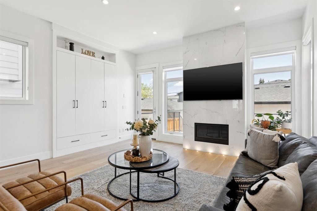 1424 27 Street Sw, Calgary, AB - Indoor Photo Showing Living Room With Fireplace