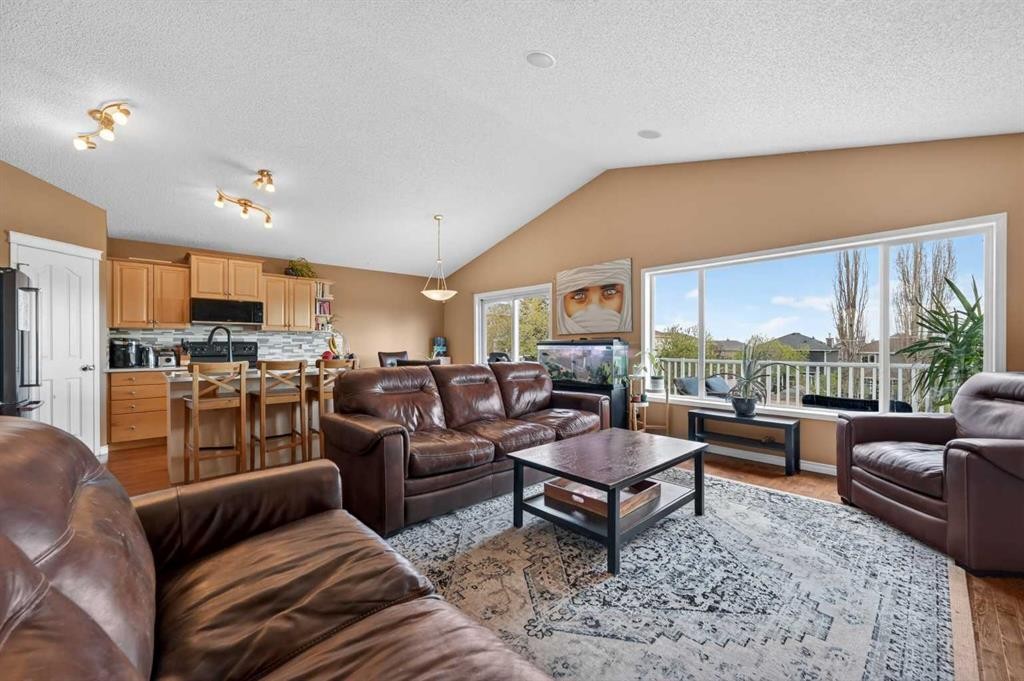 44 Bridlepost Green Sw, Calgary, AB - Indoor Photo Showing Living Room