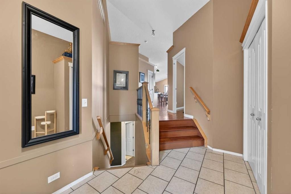44 Bridlepost Green Sw, Calgary, AB - Indoor Photo Showing Other Room