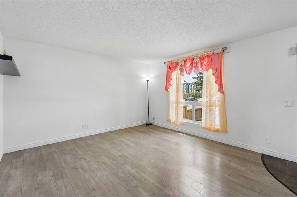 83 Appletree Close Se, Calgary, AB - Indoor Photo Showing Other Room