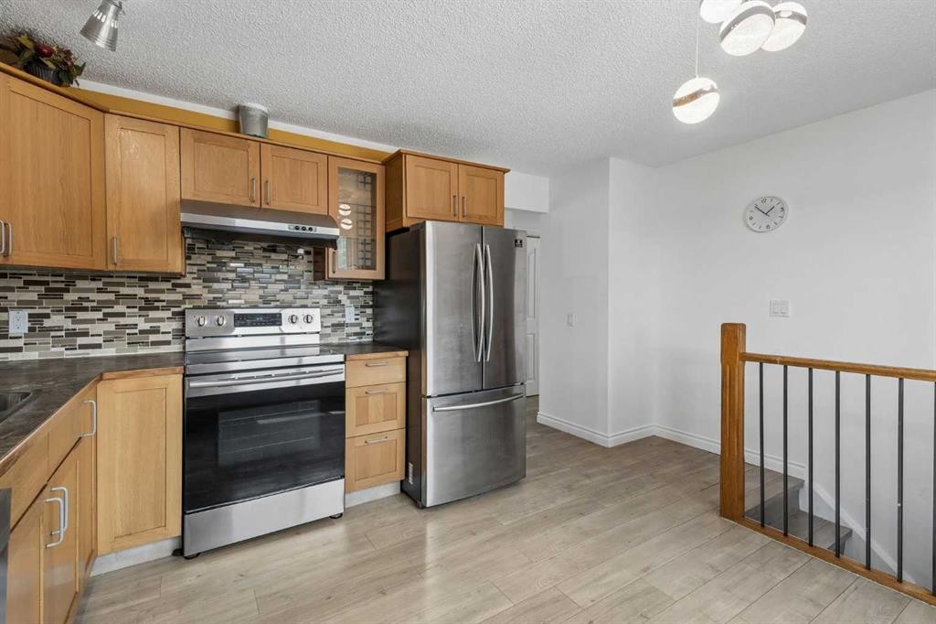 83 Appletree Close Se, Calgary, AB - Indoor Photo Showing Kitchen
