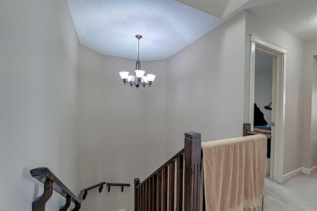247 Pantego Way Nw, Calgary, AB - Indoor Photo Showing Other Room