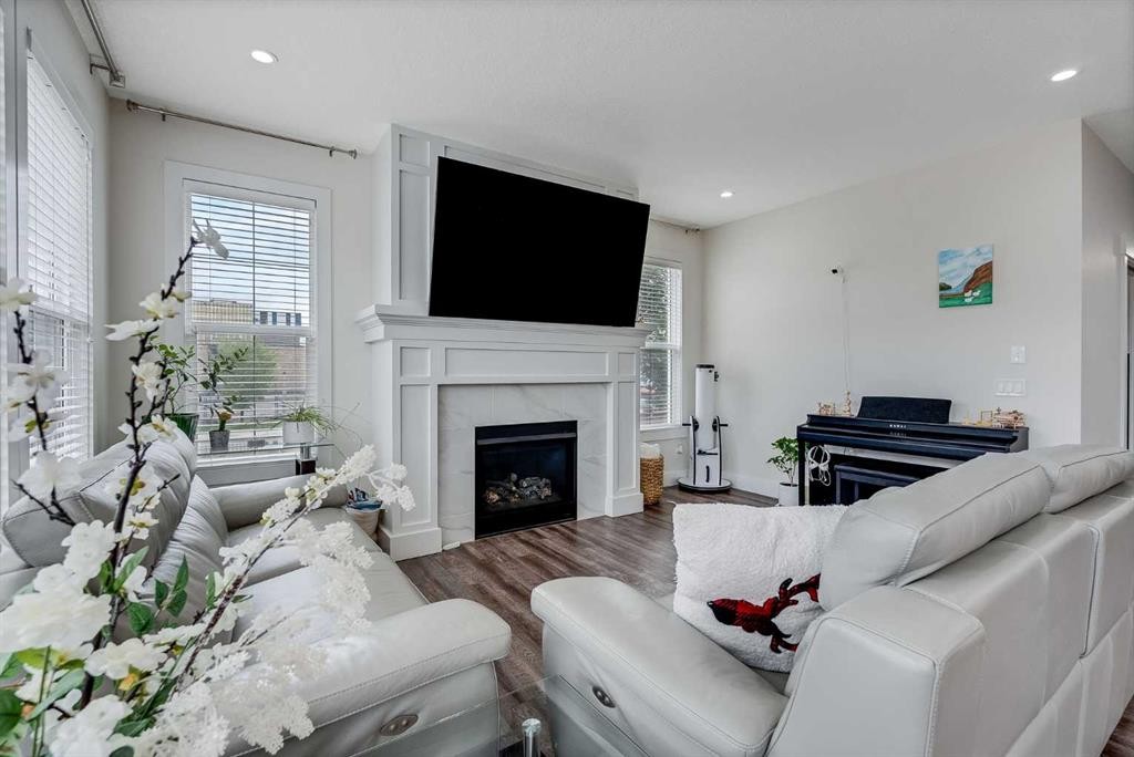4 Legacy Court Se, Calgary, AB - Indoor Photo Showing Living Room With Fireplace