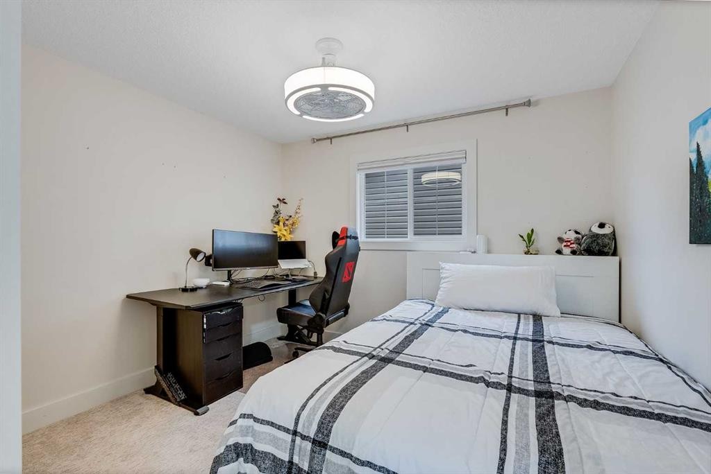4 Legacy Court Se, Calgary, AB - Indoor Photo Showing Bedroom