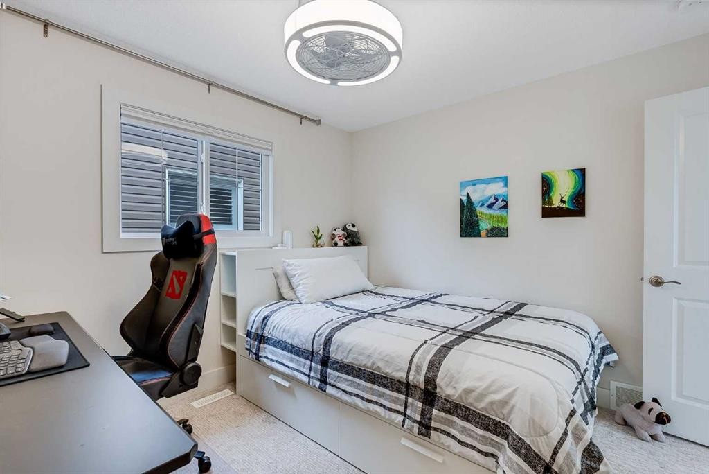 4 Legacy Court Se, Calgary, AB - Indoor Photo Showing Bedroom