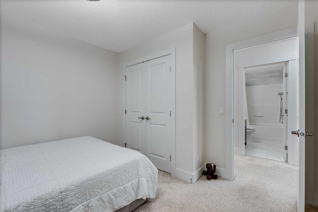 4 Legacy Court Se, Calgary, AB - Indoor Photo Showing Bedroom
