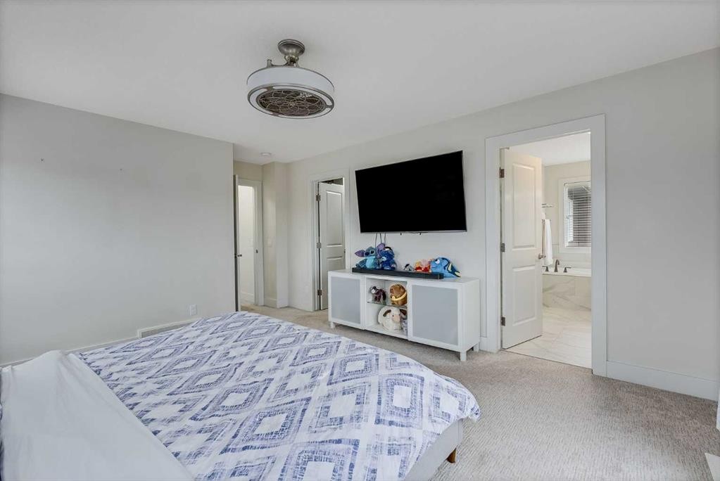 4 Legacy Court Se, Calgary, AB - Indoor Photo Showing Bedroom