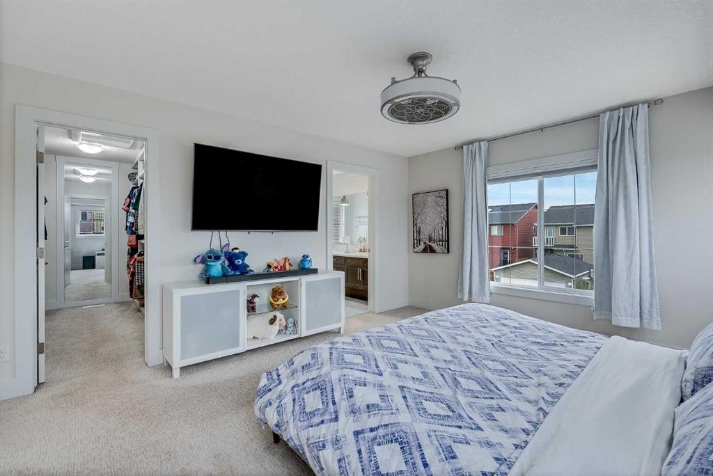 4 Legacy Court Se, Calgary, AB - Indoor Photo Showing Bedroom