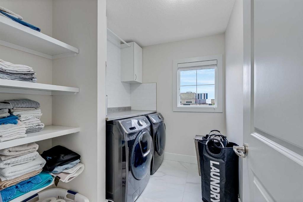 4 Legacy Court Se, Calgary, AB - Indoor Photo Showing Laundry Room