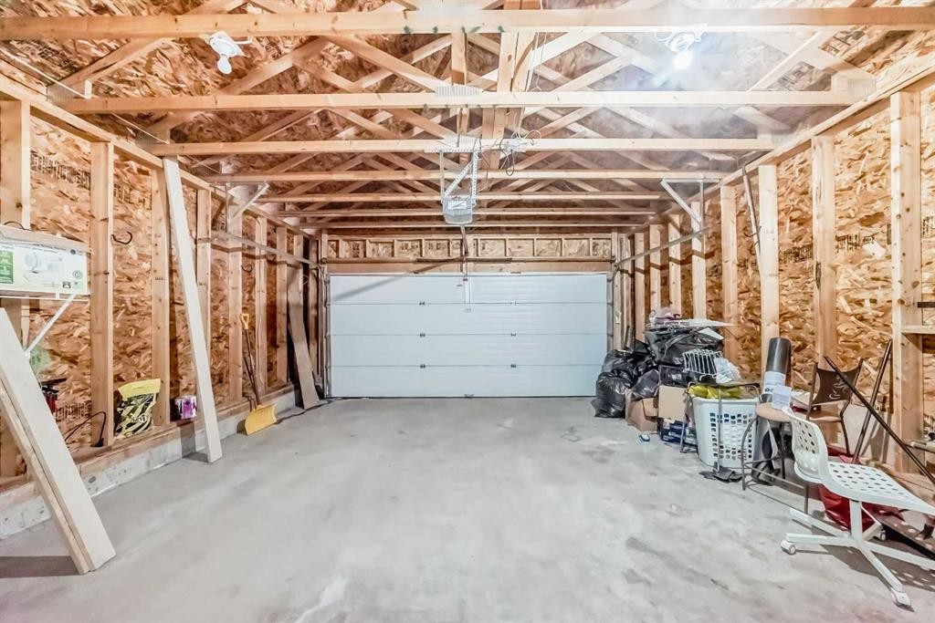 36 Saddleland Court Ne, Calgary, AB - Indoor Photo Showing Garage