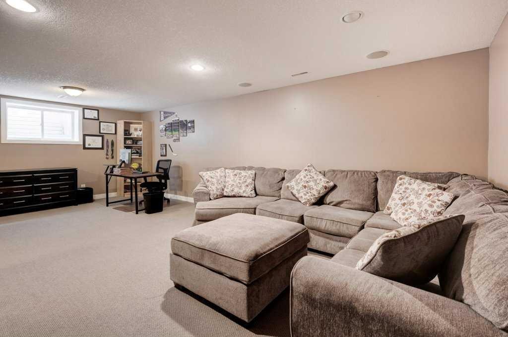 88 Copperstone Gate Se, Calgary, AB - Indoor Photo Showing Living Room