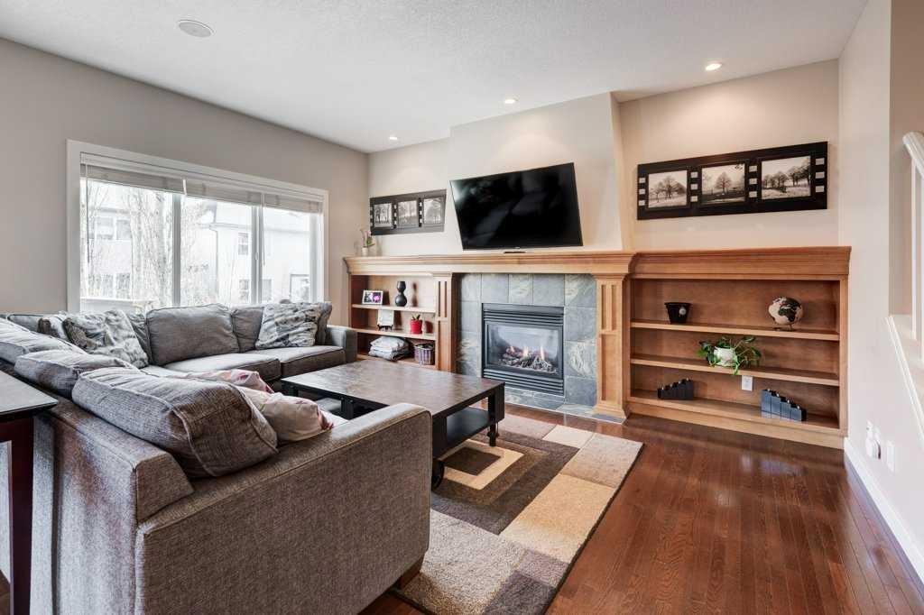 88 Copperstone Gate Se, Calgary, AB - Indoor Photo Showing Living Room With Fireplace