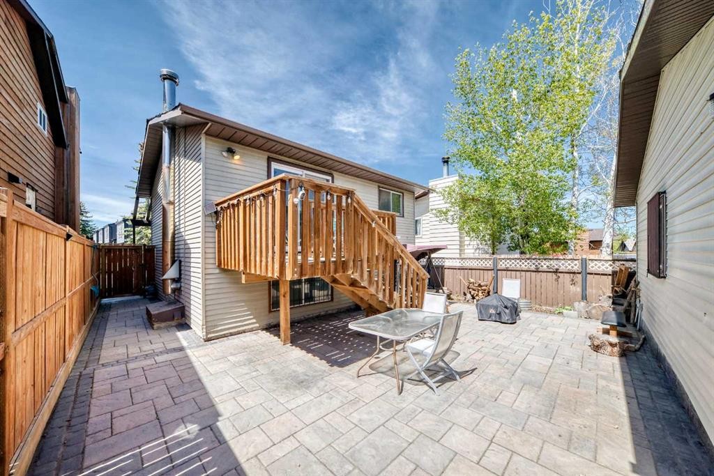 52 Beacham Road Nw, Calgary, AB - Outdoor With Deck Patio Veranda With Exterior