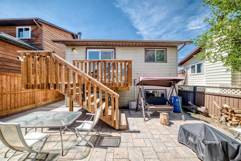 52 Beacham Road Nw, Calgary, AB - Outdoor With Deck Patio Veranda With Exterior