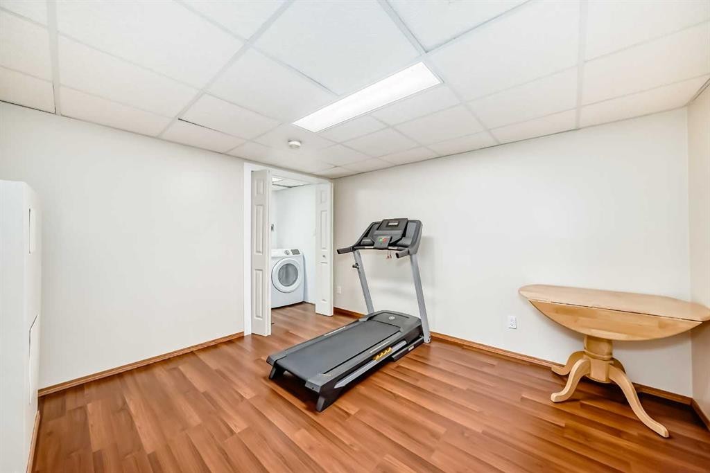 31 Harvest Oak Circle Ne, Calgary, AB - Indoor Photo Showing Gym Room