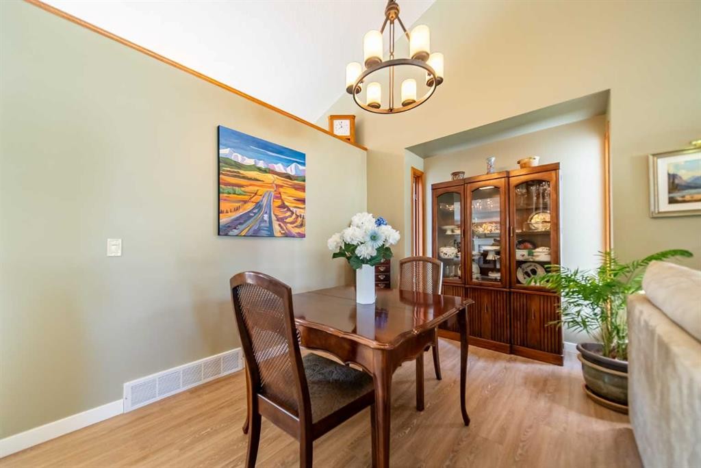 76 Sunset Crescent, Okotoks, AB - Indoor Photo Showing Dining Room