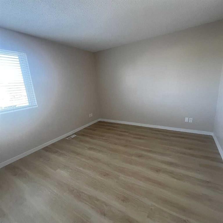 140 Martindale Boulevard Ne, Calgary, AB - Indoor Photo Showing Other Room