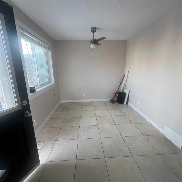 140 Martindale Boulevard Ne, Calgary, AB - Indoor Photo Showing Other Room