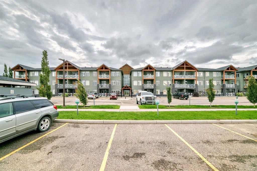 111-1005B Westmount Drive, Strathmore, AB - Outdoor With Facade