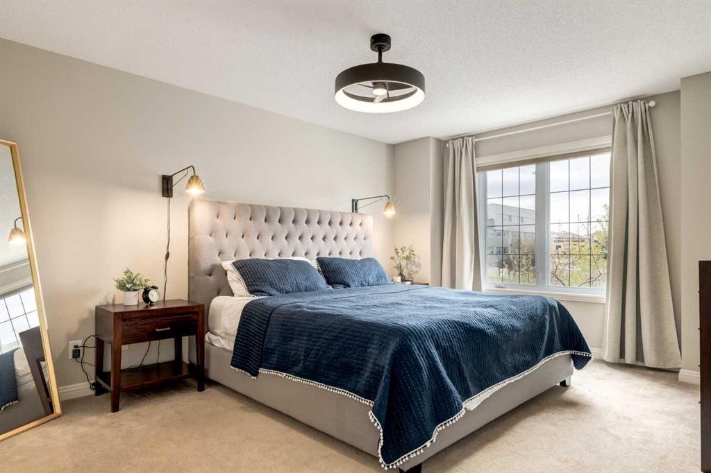 3117 Don Ethell Boulevard Sw, Calgary, AB - Indoor Photo Showing Bedroom
