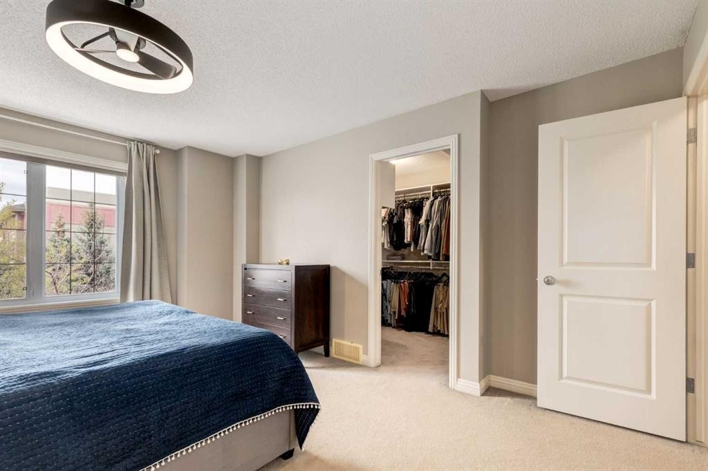 3117 Don Ethell Boulevard Sw, Calgary, AB - Indoor Photo Showing Bedroom